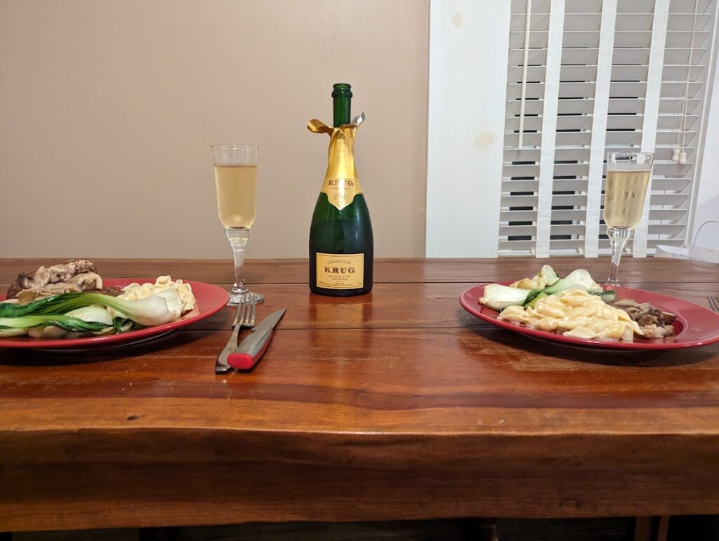 Home cooked meal with fancy bubbles for our first anniversary